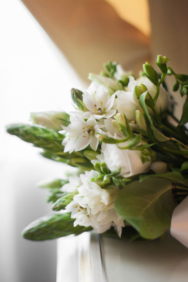 Flowers resting on coffin