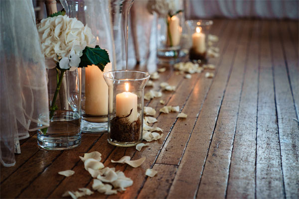 Petals in church aisle for wedding